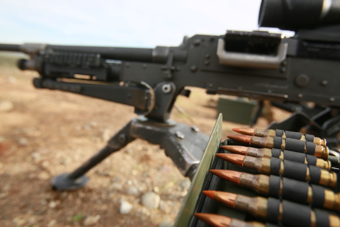 7.62 mm rounds rest on an ammo can next to an M240B medium machine gun during a realistic urban training exercise aboard Camp Roberts, Calif., Dec. 9, 2014. RUT prepares the 15th Marine Expeditionary Unit's Marines for their upcoming deployment, enhancing their combat skills in environments similar to those they may find in future missions. (U.S. Marine Corps photo by Sgt. Jamean Berry/Released)