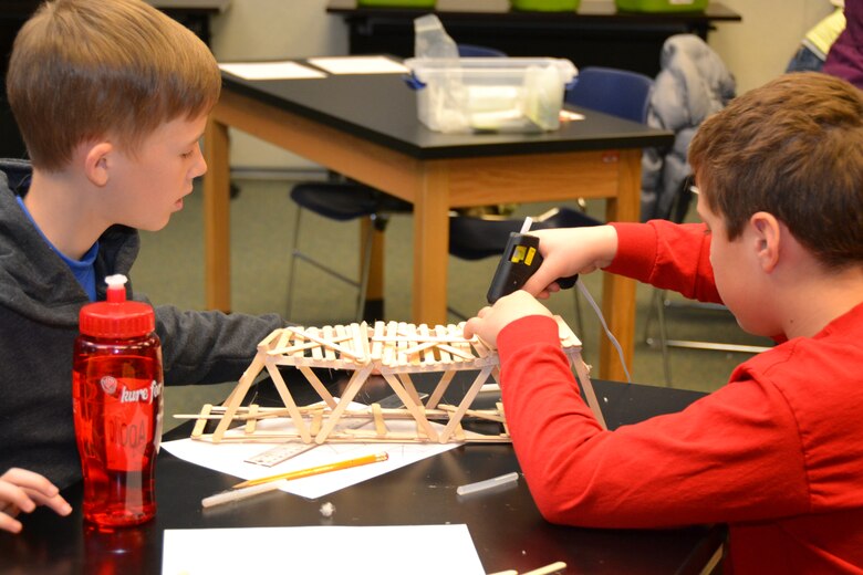 WINCHESTER Va. - Students at the STARBASE Academy build a popsicle bridge.