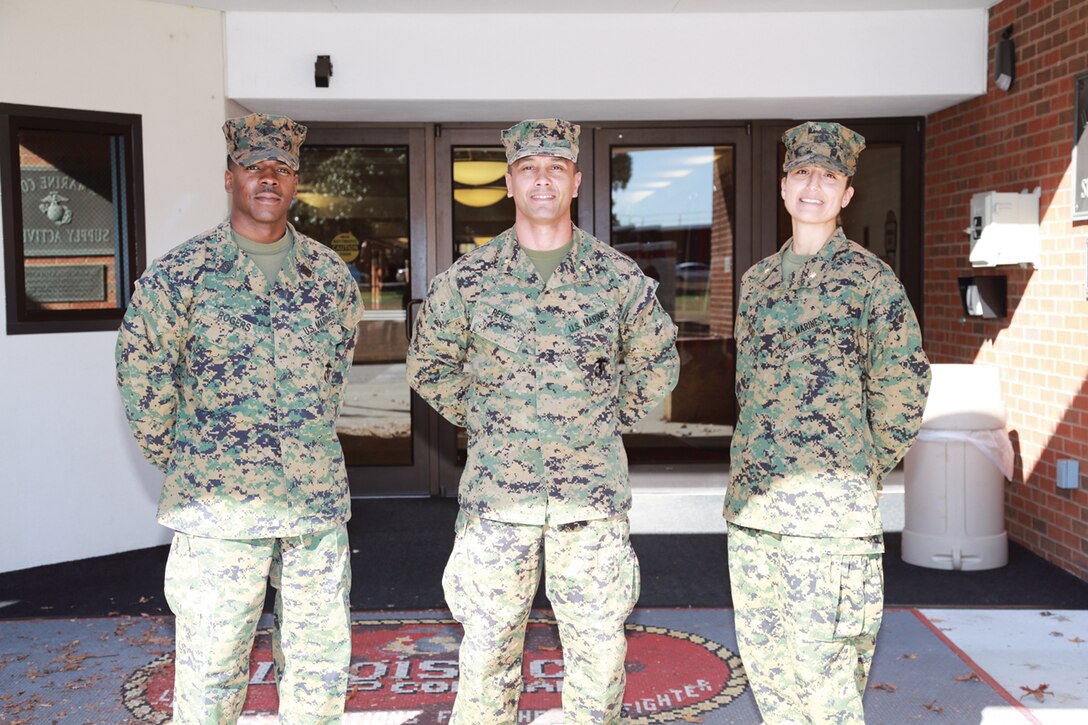 A team of Marine Corps Logistics Command Marines deployed to Afghanistan, April 19, for a six-month tour. In the photo, Master Sgt. Darrell Rogers (left), Maj. Javier Reyes (center), and Maj. Paulina Rojas returned to the base, Nov.  4. “Our mission was to retrograde all of the Marine Corps equipment that was being utilized in Operation Enduring Freedom in Afghanistan,” Rogers said. “We were responsible for getting all of that back to Albany to reset, rebuild it in order to get it back out to the fleet forces.