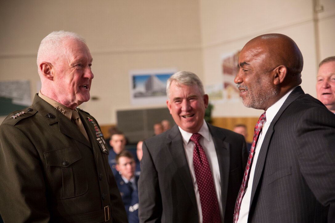 Lt. Gen. Richard P. Mills (left), commander of Marine Forces Reserve, greets members of the New Orleans city council at the city hall as part of the council’s Military Appreciation Day, Dec. 11, 2014. Senior military leaders from the area gathered in front of the Mayor’s Military Advisory Committee to give an overview of the impact their commands have had in the community. (U.S. Marine Corps photo by Lance Cpl. Ian Leones/Released)