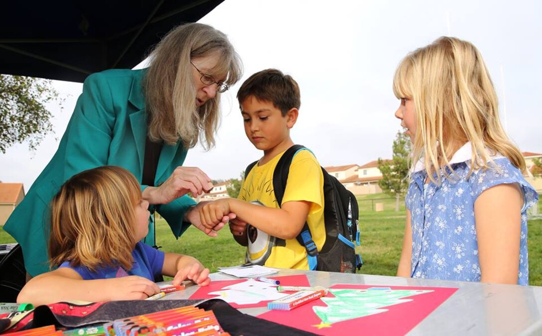 Base residents participated in a Family Readiness Resource Fair conducted by Marine Corps Community Services' Marine Corps Family Team Building group at the Stuart Mesa Housing area, here Dec. 10. (Photos by Lance Cpl. Asia J. Sorenson/Released) 
