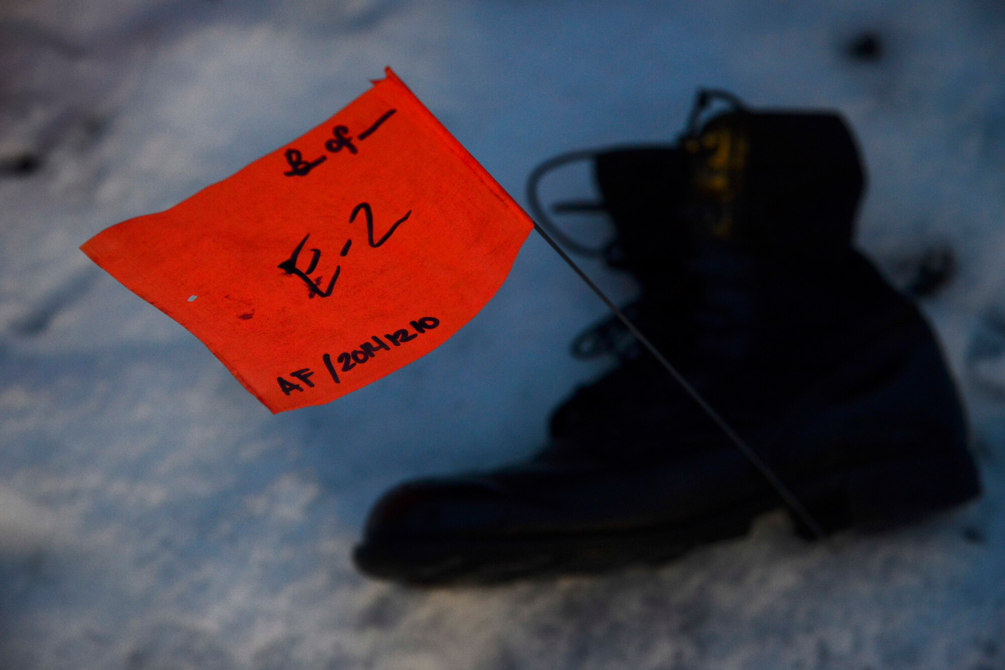 Evidence from a simulated C-130 Hercules crash is marked on the scene at Misawa Air Base, Japan, Dec. 10, 2014. Members of the 35th Force Support Squadron constructed a search and recovery team to recover casualties and evidence as part of Beverly Sunrise 15-1, an exercise that involved five Pacific Air Forces wings. (U.S. Air Force photo by Staff Sgt. Derek VanHorn/Released)