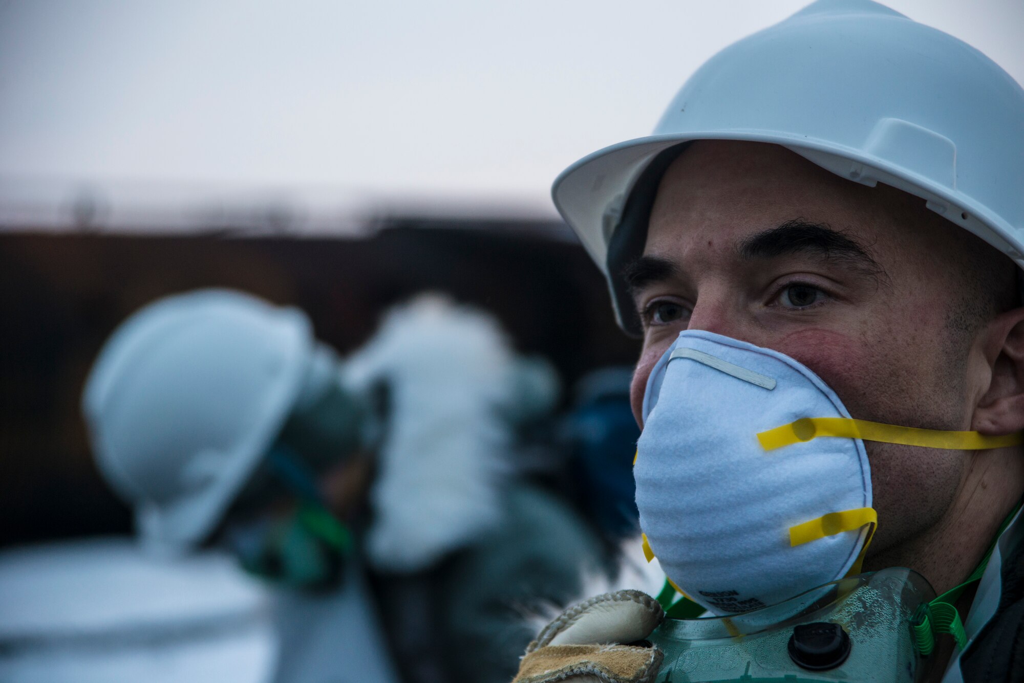 Tech. Sgt. Boris Hyzcko, 35th Force Support Squadron search and recovery team leader, assesses damage after a simulated C-130 Hercules crashed at Misawa Air Base, Japan, Dec. 10, 2014. Airmen from the 35 FSS perform search and recovery as an additional duty during emergency situations. The search and recovery was executed in support of exercise Beverly Sunrise 15-1. (U.S. Air Force photo by Staff Sgt. Derek VanHorn/Released)