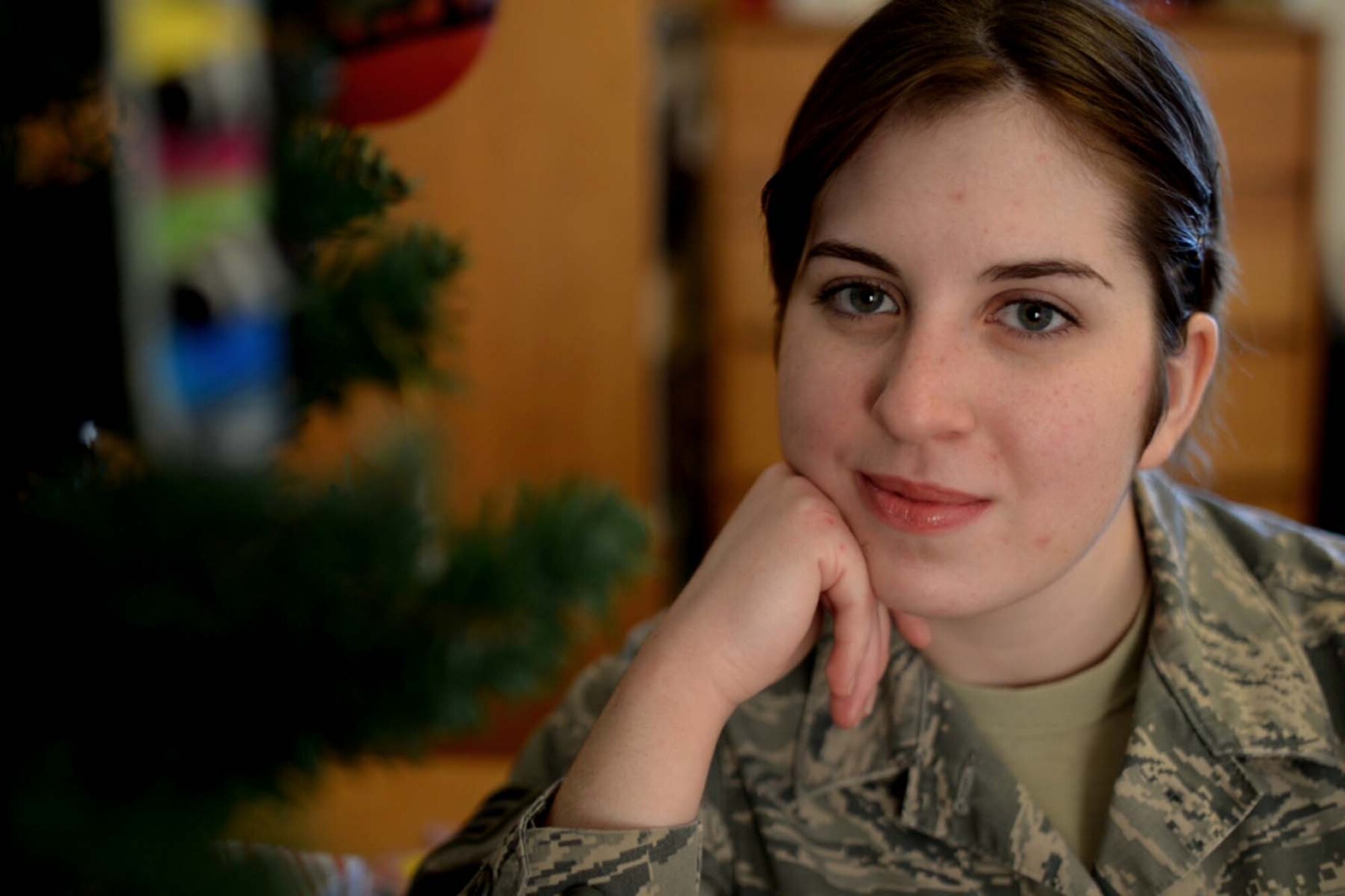 Senior Airman Lucille Perkins-Wagel, 28th Force Support Squadron services technician, will have spent the last three holiday seasons away from her family. Each year, Perkins-Wagel goes to great lengths to ensure the season of fellowship and holiday cheer never loses its meaning. (U.S. Air Force Photo by Senior Airman Jordan Thompson/Released)