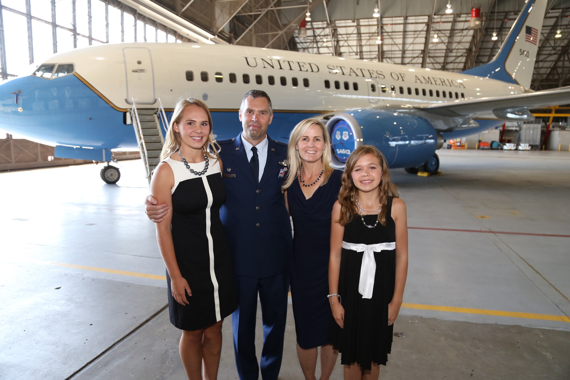 (Left to right) Oldest daughter Gabriella, Col. Karl Goerke, wife Christine, and daughter Isabella met the Airmen of the 932nd Airlift Wing during a change of command ceremony on Sept. 13, 2014 at Scott Air Force Base, Illinois. (U.S. Air Force photo/Tech. Sgt. Christopher Parr)