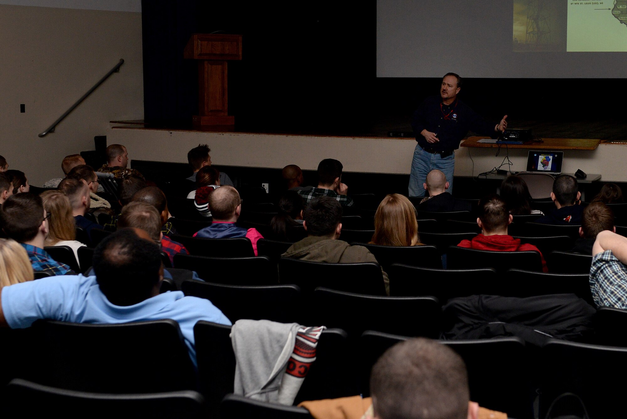 The 15th Operational Weather Squadron hosted a severe storm spotter training for members of Team Scott Dec. 4, 2014 at Scott Air Force Base, Ill. The course teaches individuals the basics of thunderstorm development, storm structure, what features to look for and where to find them. After attending the training, individuals were offered the opportunity to become volunteer weather spotters for the National Weather Service in the local area. (U.S. Air Force photo/ Airman 1st Class Kiana Brothers)