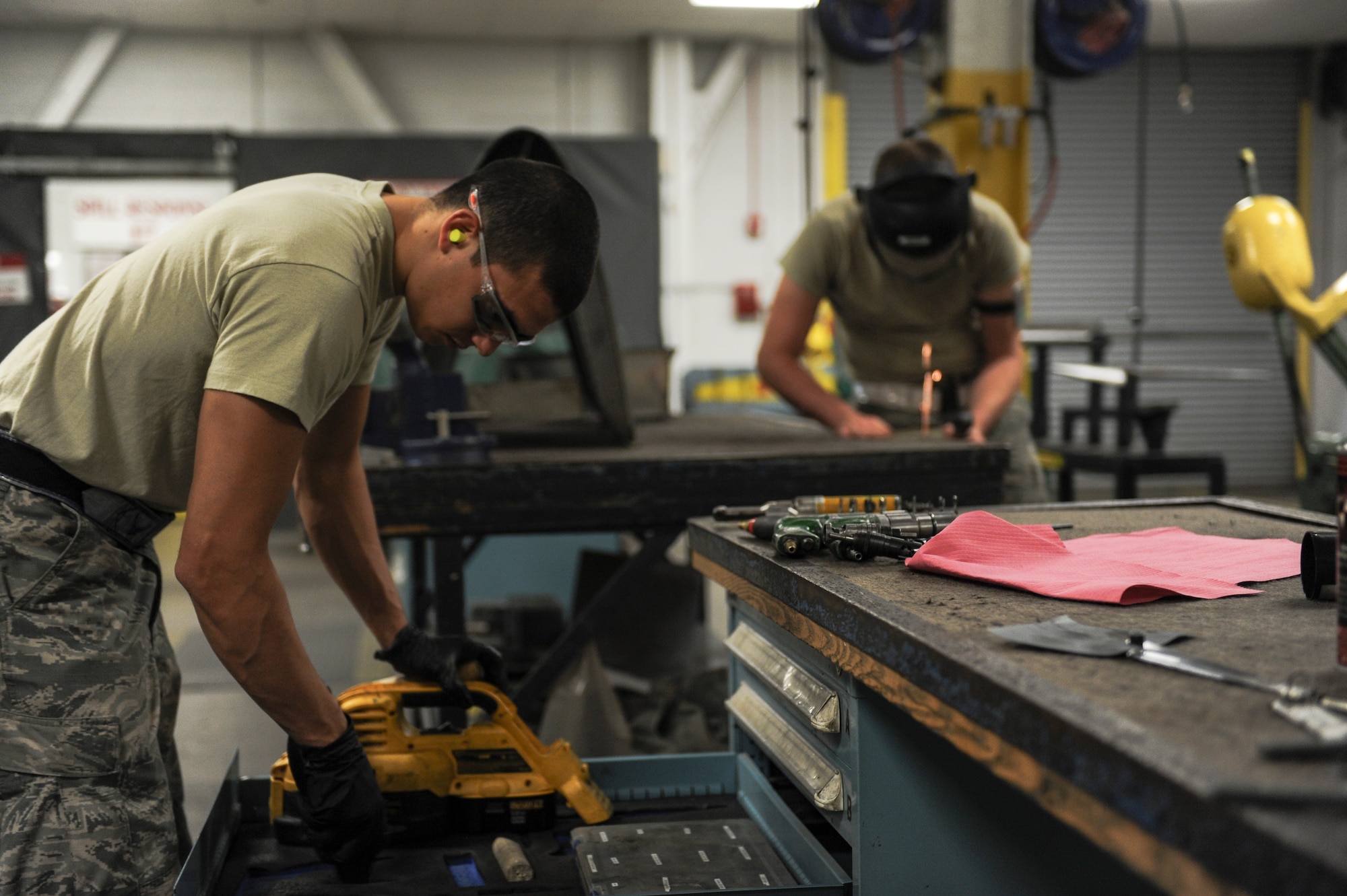 The 19th Aircraft Maintenance Squadron sheet metal shop is 24-hour operations guaranteeing the combat airlift mission here never stops. These day-shift Airmen make repairs and fabricate aircraft structures working with metals, plastics, tubing and cables. (U.S. Air Force photo by Senior Airman Cliffton Dolezal)  