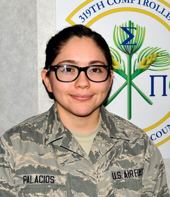 Senior Airman Kimberly Palacios is a customer service technician with the 319th Comptroller Squadron. Palacios was named the Warrior of the Week for the third week of December, 2014. (U.S. Air Force photo/Staff Sgt. Susan L. Davis)