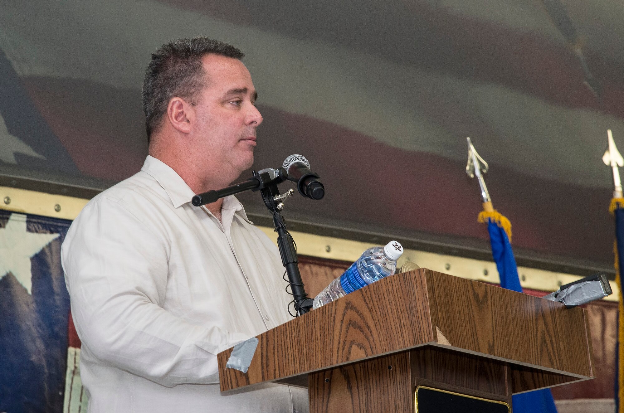 Robert A. Lewis, 575th Aircraft Maintenance Squadron director, addresses the crowd for the first time as the 575th AMXS dedicated squadron director during an activation ceremony Dec. 11 at Joint Base San Antonio-Randolph. The 575th AMXS is a geographically separate unit assigned to the 309th Aircraft Maintenance Group, Ogden Air Logistics Complex Hill Air Force Base, Utah. The squadron is responsible for depot level maintenance, restoration and modification of over 500 T-38 Talon aircraft for the United States Air Force and Navy. (U.S. Air Force photo by Johnny Saldivar)