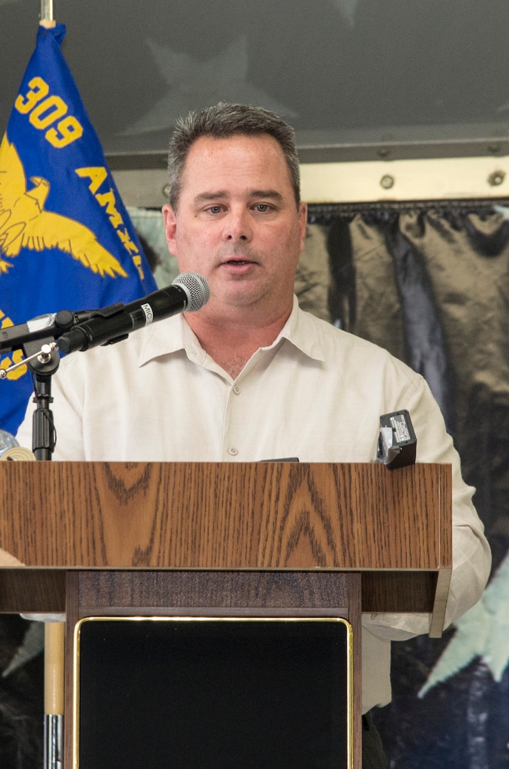 Robert A. Lewis, 575th Aircraft Maintenance Squadron director, addresses the crowd for the first time as the 575th AMXS dedicated squadron director during an activation ceremony Dec. 11 at Joint Base San Antonio-Randolph. The 575th AMXS is a geographically separate unit assigned to the 309th Aircraft Maintenance Group, Ogden Air Logistics Complex Hill Air Force Base, Utah. The squadron is responsible for depot level maintenance, restoration and modification of over 500 T-38 Talon aircraft for the United States Air Force and Navy. (U.S. Air Force photo by Johnny Saldivar)