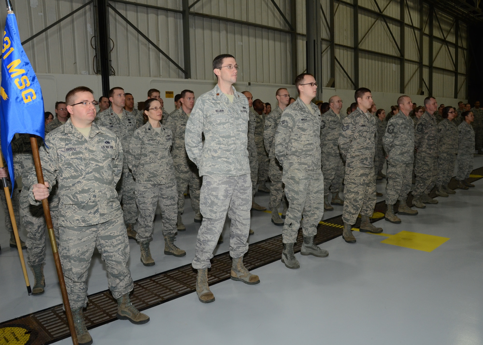 Members of the 131st Mission Support Group stand in formation during Lt. Col. Michael Jurries's 131st MSG Assumption of Command ceremony at Whiteman Air Force Base, Mo., Dec. 7, 2014.

(U.S. Air National Guard photo by Airman 1st Class Halley Burgess)