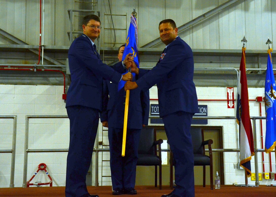 Lt. Col. Michael Jurries accepts the 131st Mission Support Group guidon from Col. Michael Francis, 131st Bomb Wing commander, during Jurries's Assumption of Command ceremony at Whiteman Air Force Base, Mo., Dec. 7, 2014.

(U.S. Air National Guard photo by Airman 1st Class Halley Burgess)