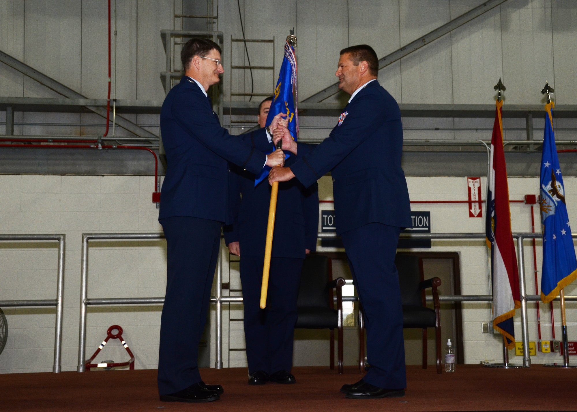 Lt. Col. Michael Jurries accepts the 131st Mission Support Group guidon from Col. Michael Francis, 131st Bomb Wing Commander, during Jurries's Assumption of Command ceremony at Whiteman Air Force Base, Mo., Dec. 7, 2014.

(U.S. Air National Guard photo by Airman 1st Class Halley Burgess)