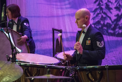 Technical Sergeant Charles Lawyer, U.S. Air Force Band of the West Concert Band percussionist, plays the timpani during the annual Holiday in Blue Concert Dec. 6 at the Edgewood Theatre of Performing Arts in San Antonio, Texas. The Band of the West is composed of a 60-member squadron comprised of nine different musical configurations. The band executes more than 300 annual musical productions and is responsible for a seven state, 580,000 square mile region. (U.S. Air Force photo by Master Sgt. Sean M. Worrell)