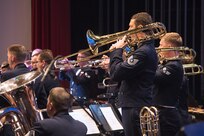 Technical Sergeant Matthew Erickson, U.S. Air Force Band of the West Concert Band trombonist, plays holiday classics during the annual Holiday in Blue Concert Dec. 6 at the Edgewood Theatre of Performing Arts in San Antonio, Texas. The Band of the West is composed of a 60-member squadron comprised of nine different musical configurations. The band executes more than 300 annual musical productions and is responsible for a seven state, 580,000 square mile region. (U.S. Air Force photo by Master Sgt. Sean Worrell)