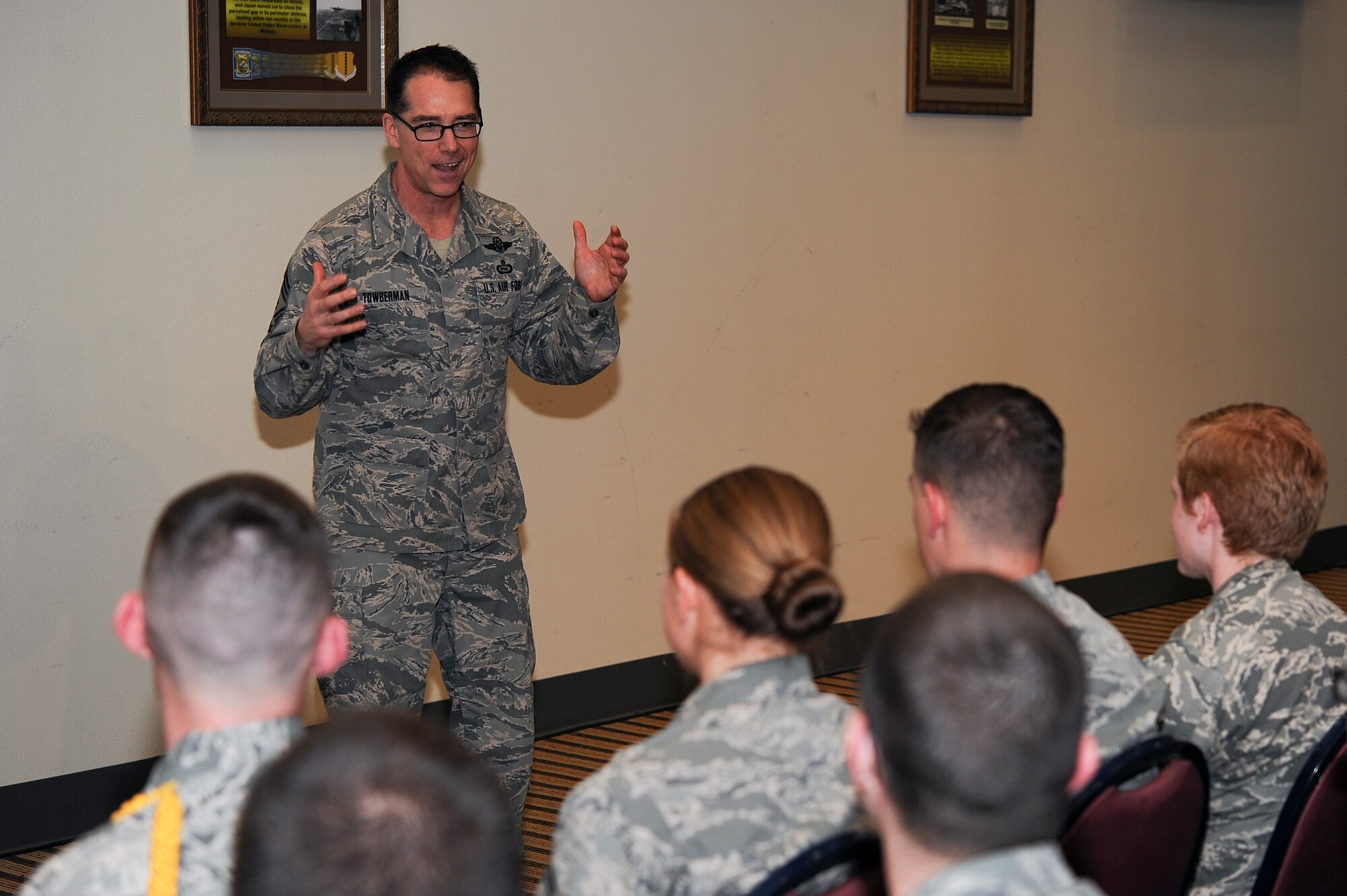 GOODFELLOW AIR FORCE BASE, Texas – Chief Master Sgt. Roger A. Towberman, 25th Air Force Command Chief, talks with 315th and 316th Training Squadron students at the Event Center Dec. 10. During his visit, Towberman listened to students’ expectations of the operational Air Force and told stories of his career to enlighten them. (U.S. Air Force photo/ Airman 1st Class Devin Boyer)