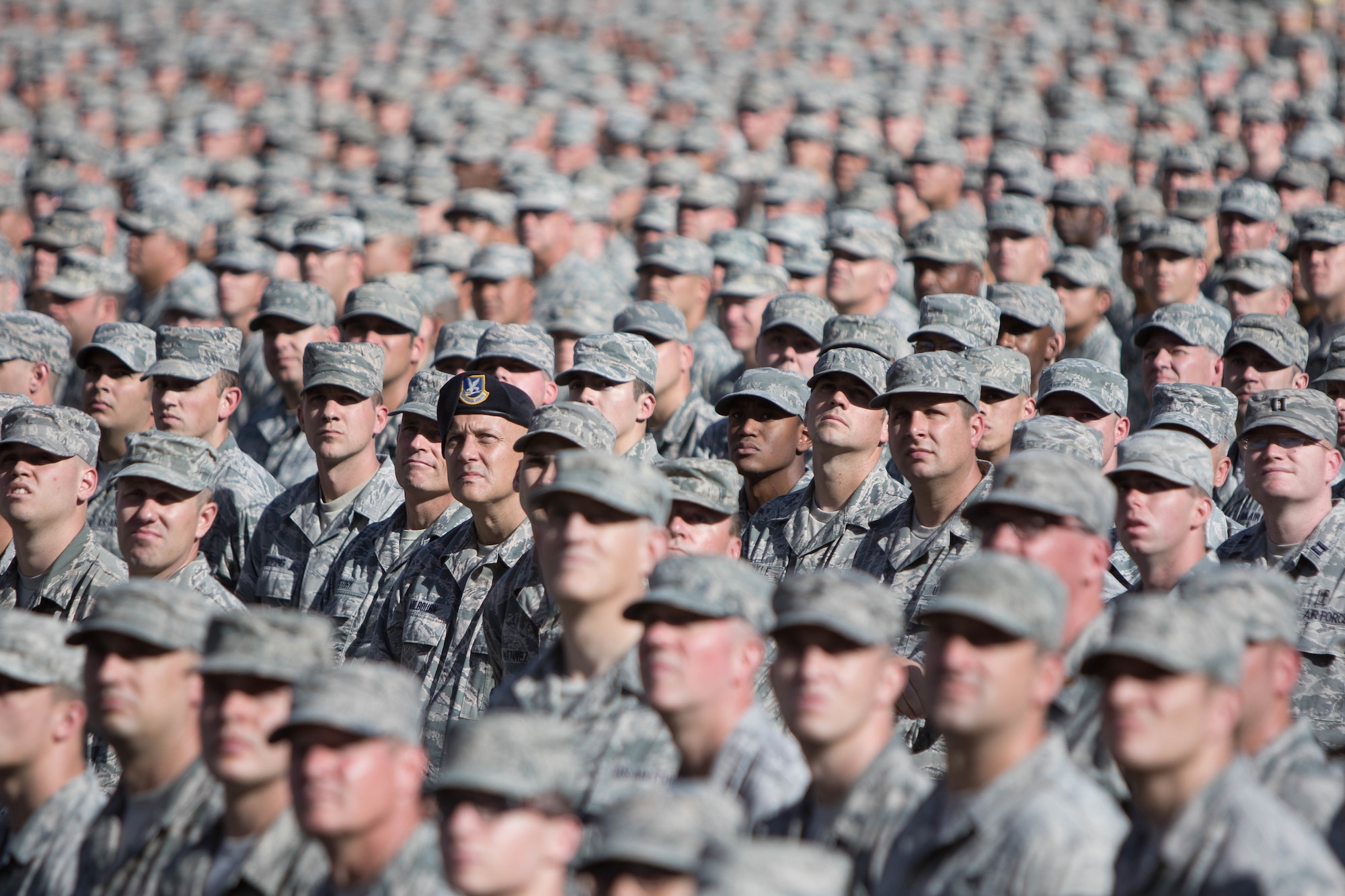 Soldiers and Airmen from the Arizona National Guard assemble together in a mass formation during the Arizona National Guard Muster Dec. 7 at Arizona State University's Sun Devil Stadium in Tempe, Ariz. More than 3800 Guard Members from throughout the state were present for the historic muster formation. (U.S. Army National Guard Photo by Staff Sgt. Brian A. Barbour)