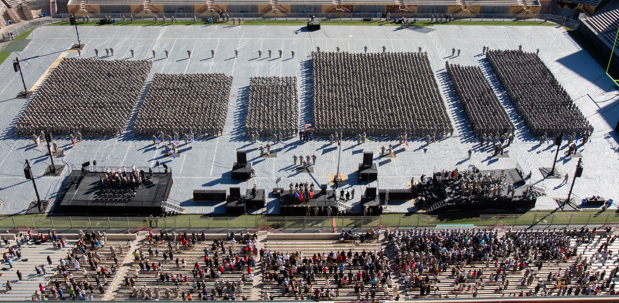 Soldiers and Airmen from the Arizona National Guard assemble together in a mass formation during the Arizona National Guard Muster Dec. 7 at Arizona State University's Sun Devil Stadium in Tempe, Ariz. More than 3800 Guard Members from throughout the state were present for the historic muster formation. (U.S. Army National Guard Photo by Staff Sgt. Brian A. Barbour)