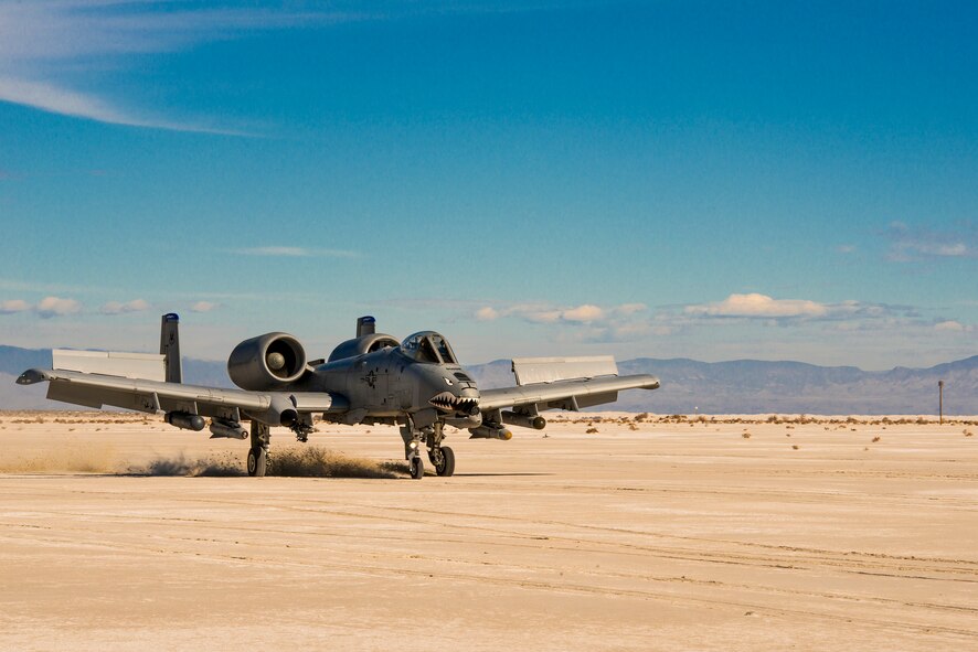 U.S. Air Force Lt. Col. Ryan Haden, 74th Fighter Squadron commander, lands an A-10C Thunderbolt II in the sand Dec. 3, 2014, at the White Sands Missile Range, N.M. The A-10’s ability to land on a desert landing strip allows for increased refueling and re-arming opportunities. (U.S. Air Force Photo by Airman 1st Class Ryan Callaghan/Released)