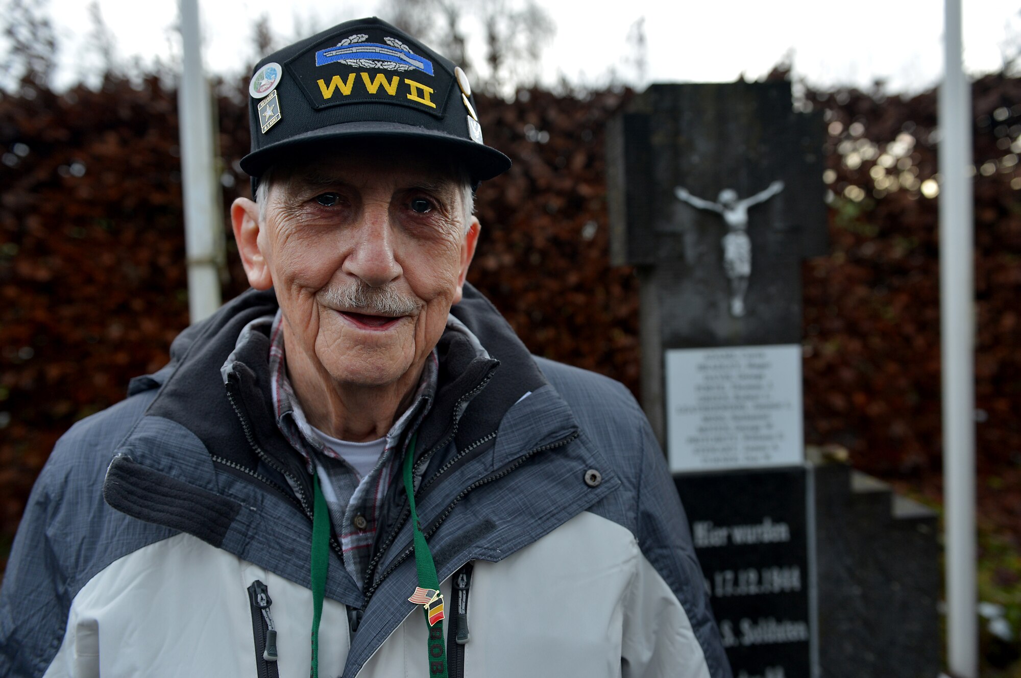 Victor Cross, World War II veteran, stands in front of the Wereth 11 memorial outside of Wereth, Belgium, Dec. 10, 2014. Cross revisited the site as part of the 70th Anniversary of the Battle of the Bulge. This battle is said to be the bloodiest battle in U.S. history with more than 20,000 U.S. Soldiers killed. (U.S. Air Force photo by Airman 1st Class Kyle Gese/Released)