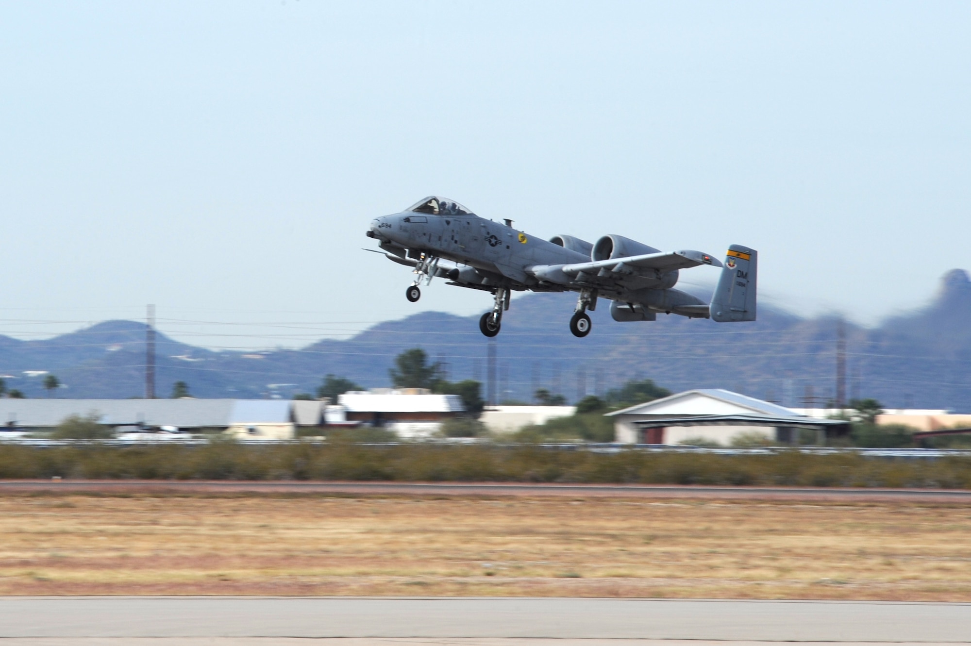 An A-10C Thunderbolt II takes to the sky for the first time after being grounded for two months at Davis-Monthan Air Force Base Ariz., Dec. 5, 2014. On Sept. 30, this aircraft came in for a routine landing, but the landing gear failed to extend. (U.S. Air Force photo by Staff Sgt. Courtney Richardson)