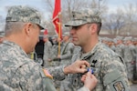 Chief of National Guard Bureau Gen. Frank Grass presented the Soldier's Medal to Staff Sgt. Robert Kelley on Dec. 6, 2014, at Camp Williams for his heroism during a civilian plane crash where he saved three lives on Aug. 10 in West Jordan, Utah.