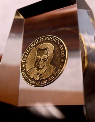A close-up of the 2014 Harold Brown Award presented to Dr. Don Erbschloe, Air Mobility Command’s chief scientist, Dec. 9, 2014, during a ceremony held in the Pentagon, Washington, D.C. The Harold Brown Award, established in December of 1968 as a tribute to Dr. Harold Brown, the eighth secretary of the Air Force and 14th secretary of defense, is the highest award given by the Air Force to a scientist or engineer who applies scientific research to solve a problem critical to the needs of the Air Force. (U.S. Air Force photo/Andy Morataya)