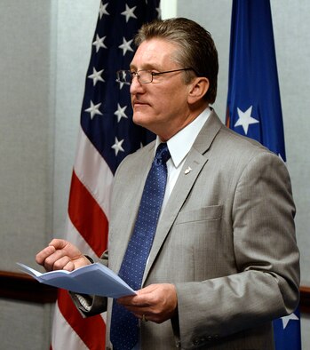Dr. Don Erbschloe, Air Mobility Command’s chief scientist, speaks after receiving the 2014 Harold Brown Award Dec. 9, 2014, during a ceremony held in the Pentagon, Washington, D.C. The Harold Brown Award, established in December of 1968 as a tribute to Dr. Harold Brown, the eighth secretary of the Air Force and 14th secretary of defense, is the highest award given by the Air Force to a scientist or engineer who applies scientific research to solve a problem critical to the needs of the Air Force. (U.S. Air Force photo/Andy Morataya)
