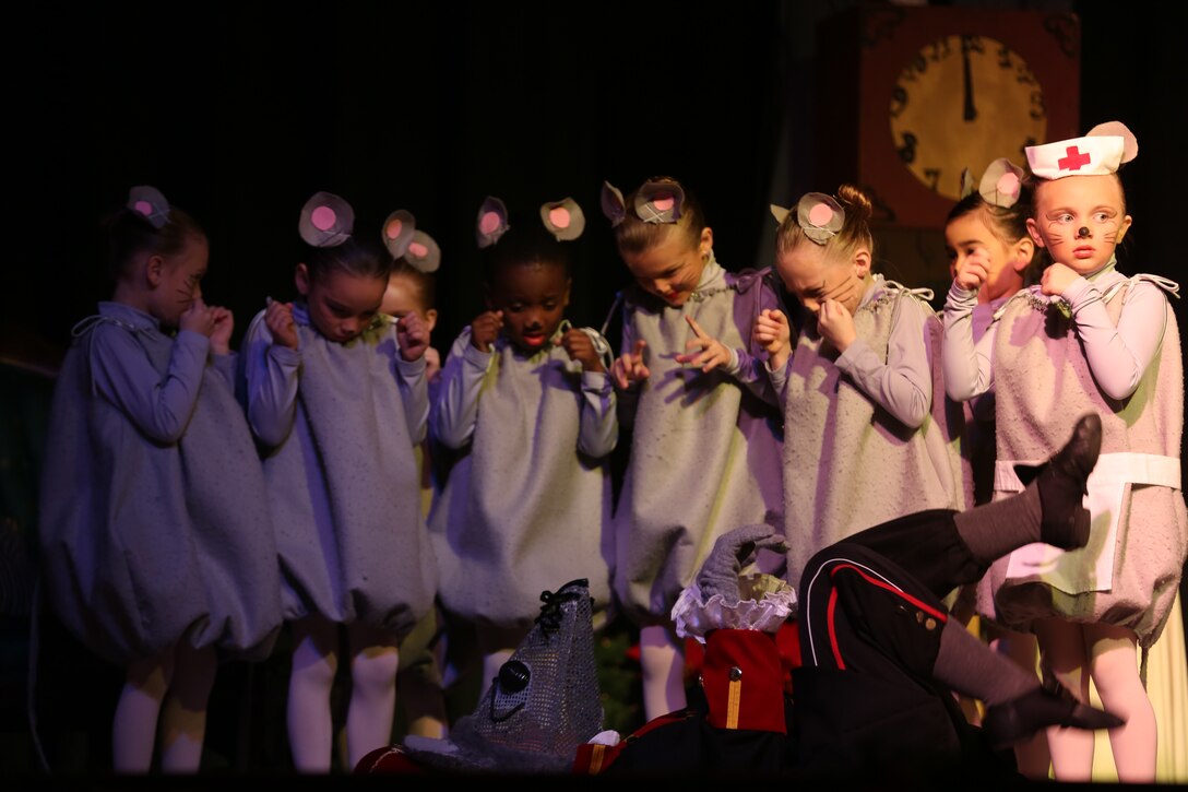 Mice weep over the defeat of the Mouse King during a performance of “The Nutcracker” at Marine Corps Air Station Cherry Point, N.C., Dec. 6, 2014. The New Bern Ballet Company presented the free play to all authorized patrons of Cherry Point.   