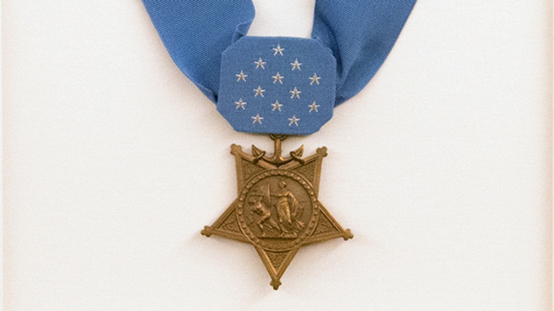 Lt. Vincent Capodanno's Medal of Honor hangs in the Capodanno Chapel at The Basic School aboard Marine Corps Base Quantico, Virginia, December 9, 2014. Capodanno was serving as a Navy chaplain with 3rd Battalion, 7th Marine Regiment during the Vietnam War and was posthumously awarded the Medal of Honor for his actions. The medal was recently donated by his family and dedicated to the chapel.
