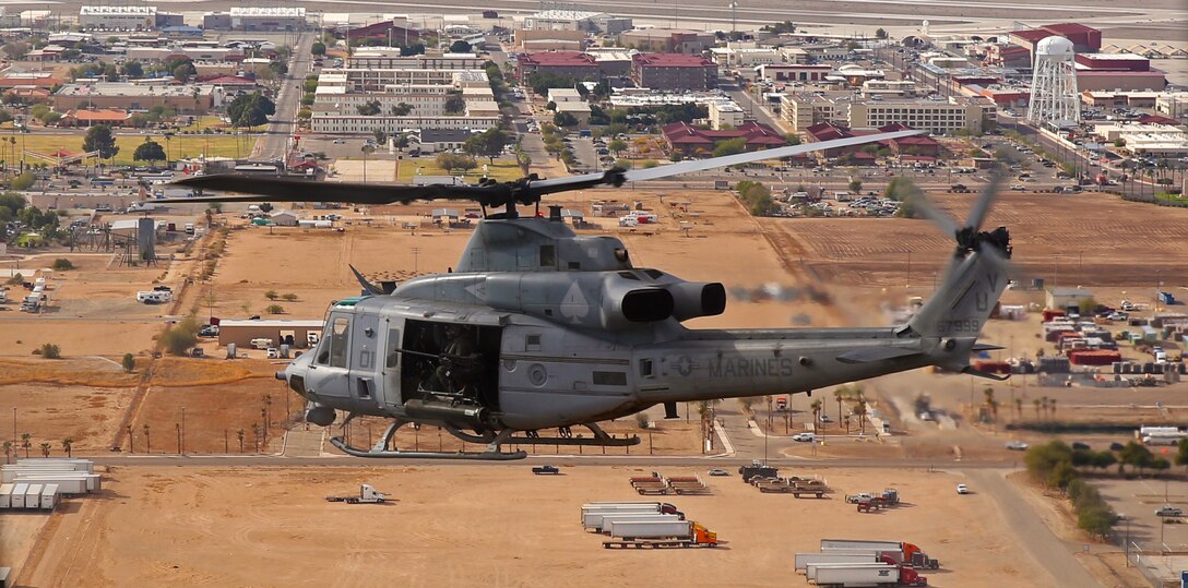A UH-1Y Venom helicopter with Marine Light Attack Helicopter Squadron 267, based out of Marine Corps Base Camp Pendleton, Calif., flies overhead during a week-long deployment-for-training exercise conducted at Marine Corps Air Station Yuma, Ariz., Dec. 9, 2014. 