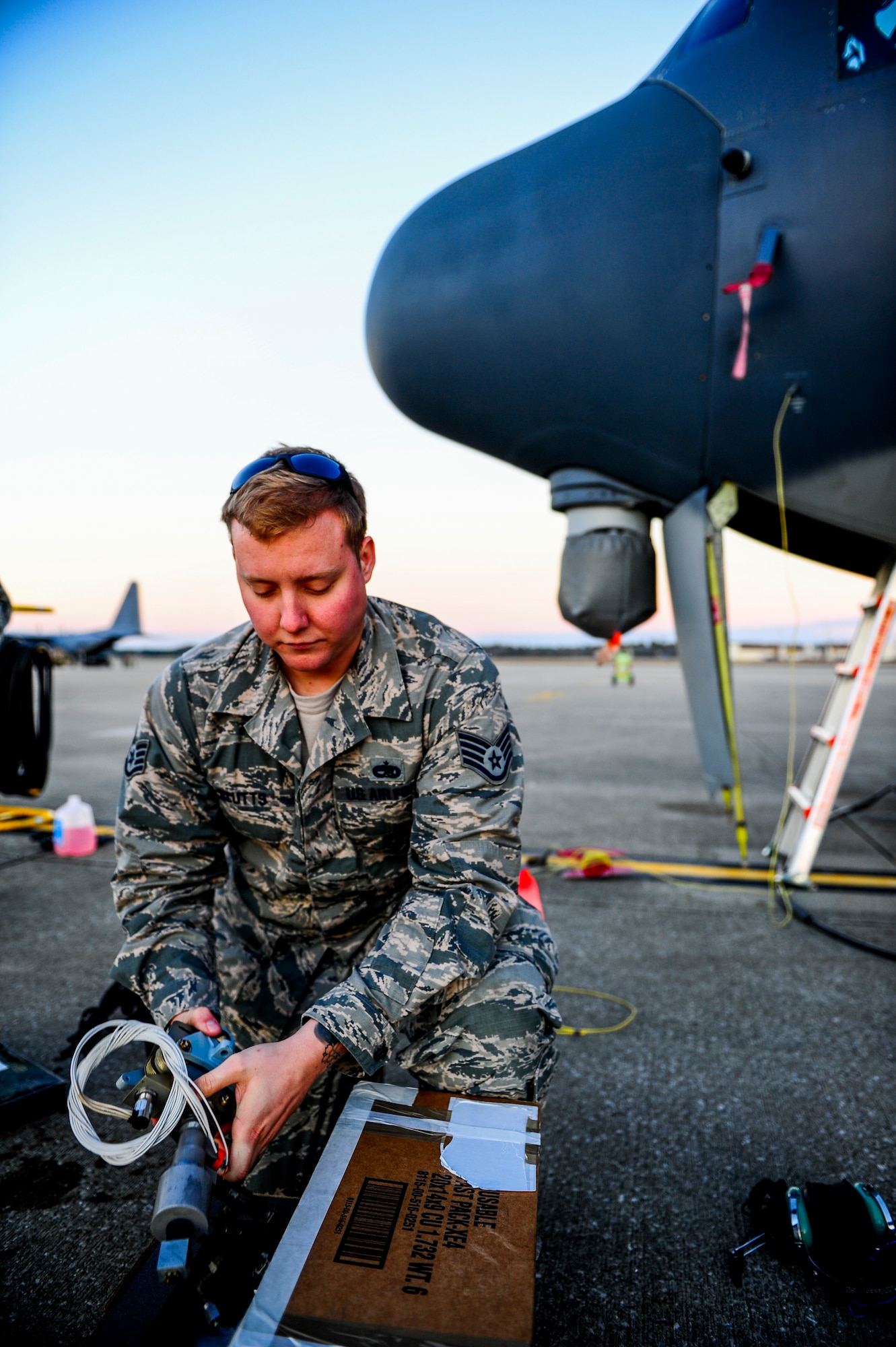 Staff Sgt. James Klutts, 9th Aircraft Maintenance Unit dedicated crew chief, works on an MC-130H Talon II at Hurlburt Field, Fla., Dec. 8, 2014. The 15th AMU’s mission is to perform equipment maintenance in support of worldwide special operations missions. (U.S. Air Force photo/Senior Airman Christopher Callaway) 