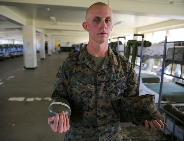 Private Mark D. Crum, Platoon 1015, Alpha Company, 1st Recruit Training Battalion, stands proud now as a United States Marine aboard Marine Corps Recruit Depot San Diego, Nov. 26.  Crum lost a total of 30 pounds and drastically improved his physical fitness abilities, earning him the platoon’s ‘Most Improved Recruit’ award, during his journey to earn the title Marine.