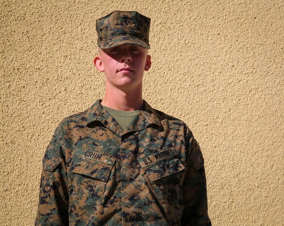 Private Mark D. Crum, Platoon 1015, Alpha Company, 1st Recruit Training Battalion, stands proud now as a United States Marine aboard Marine Corps Recruit Depot San Diego, Nov. 26.  Crum lost a total of 30 pounds and drastically improved his physical fitness abilities, earning him the platoon’s ‘Most Improved Recruit’ award, during his journey to earn the title Marine.