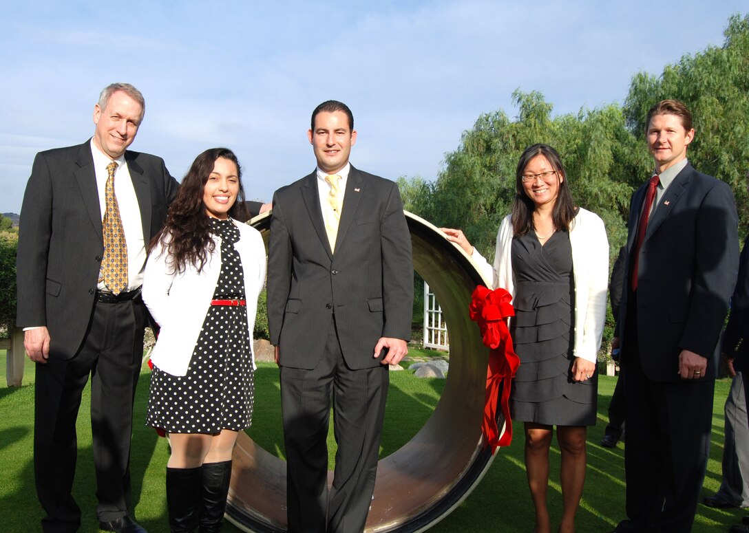 Members of the Corps' SARI Line project team mark completion of the relocation of the Santa Ana River Interceptor Line during a ceremony held Dec. 11 in Corona. From left, Tom Bucklew, Victoria Guilloty, Damien Lariviere, Eileen Takata and David Van Dorpe.