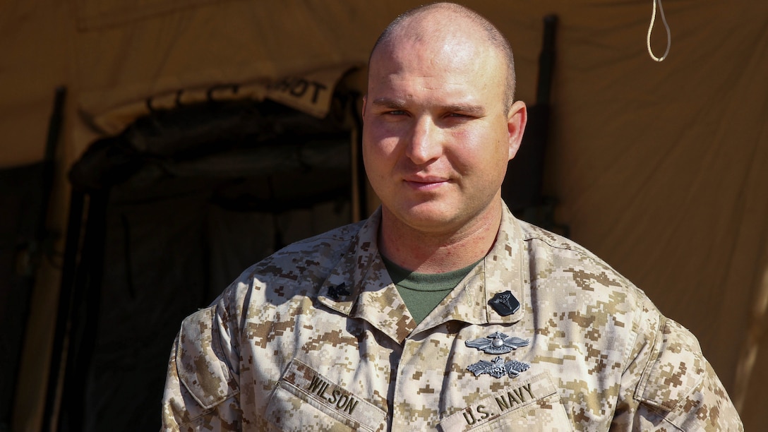 Petty Officer 2nd Class Justin Wilson, a hospital corpsman with Truck Support Company, Combat Logistics Battalion 5, supported Exercise Steel Knight 2015 at Marine Corps Air Ground Combat Center Twentynine Palms, Calif. Wilson has worked with Navy units and Marine units, caring diligently for service members during field exercises like Steel Knight, back at the barracks of Marine Corps Base Camp Pendleton and while deployed. Steel Knight is an annual exercise that includes elements from the entire I Marine Expeditionary Force. The exercise focuses on conventional operations and provides realistic training that prepares Marine for overseas operations. (U.S. Marine Corps photo by Cpl. Christopher J. Moore/Released)