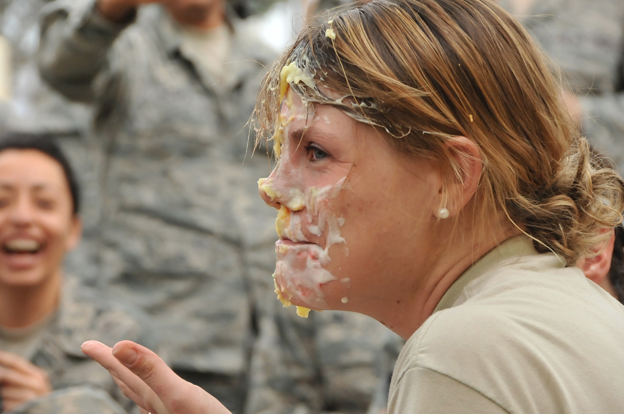 Lt. Col Beth Kelley Horine, commander, 4th Combat Camera Squadron with pie on her face from a squadron team building exercise. (courtesy photo)