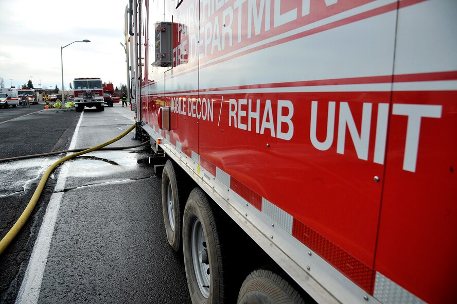Fire and hazardous material response teams from Spokane, Wash. and Team Fairchild participated in a four day exercise Dec. 10, 2014, at Fairchild Air Force Base, Wash. Units involved in the exercise included the fire and HAZMAT teams and Fairchild medical technicians, a bioenvironmental team and emergency management Airmen. (U.S. Air Force photo/Senior Airman Mary O'Dell)