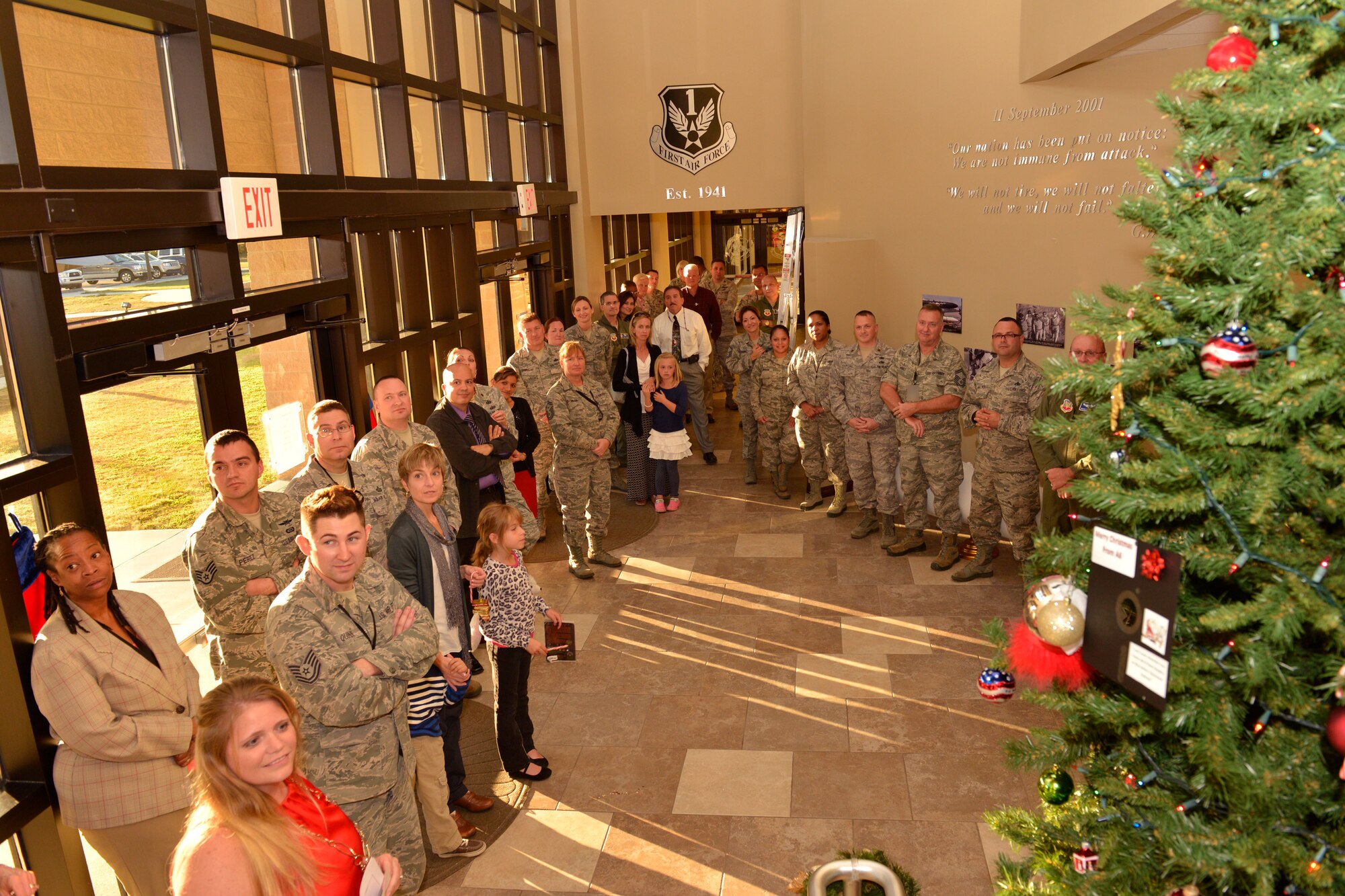 TYNDALL AIR FORCE BASE, Fla. – Members of Air Forces Northern and their families gather together for the annual tree-lighting ceremony Tuesday inside the Killey Center for Homeland Operations. The event included arts and crafts for kids, a cookie swap and refreshments following the ceremony. (U.S. Air Force Photo by Master Sgt. Kurt Skoglund/Released)