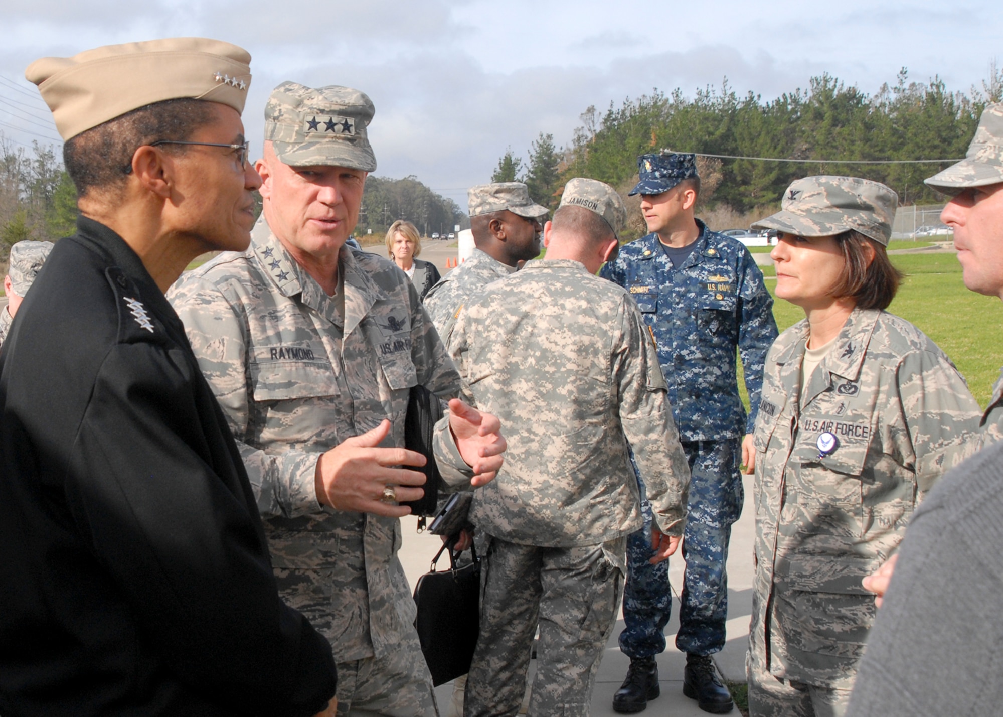 14th Air Force (Air Forces Strategic) and Joint Force Component Command for Space Commander, U.S. Air Force Lt. Gen. John. W. "Jay" Raymond, briefs U.S. Navy Adm. Cecil D. Haney, U.S. Strategic Command commander, during a visit to Vandenberg Air Force Base, Calif., Dec. 10, 2014. While there, Haney and other senior leaders from USSTRATCOM visited several facilities that support USSTRATCOM's global cyber, space and nuclear deterrence missions, including JFCC Space. (U.S. Air Force photo by Capt. Nicholas Mercurio/Released)