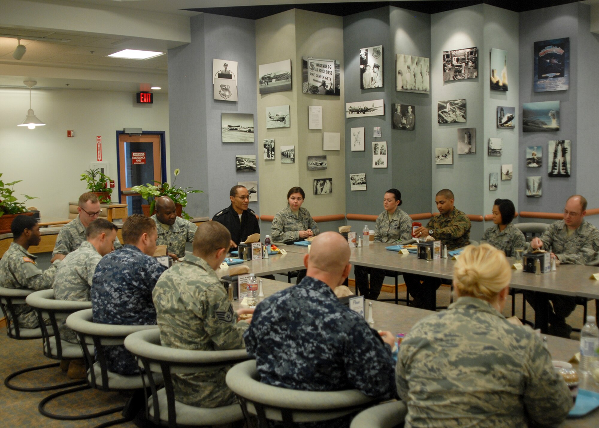 U.S. Navy Adm. Cecil D. Haney, U.S. Strategic Command commander, and U.S. Army Command Sgt. Maj. Patrick Z. Alston, senior enlisted advisor, USSTRATCOM, share breakfast with members of Joint Functional Component Command for Space during a visit to Vandenberg Air Force Base, Calif., Dec. 10, 2014.  JFCC Space is responsible for executing continuous, integrated space operations to deliver theater and global effects in support of USSTRATCOM's global strategic deterrence objectives. (U.S. Air Force photo by Capt. Nicholas Mercurio/Released)