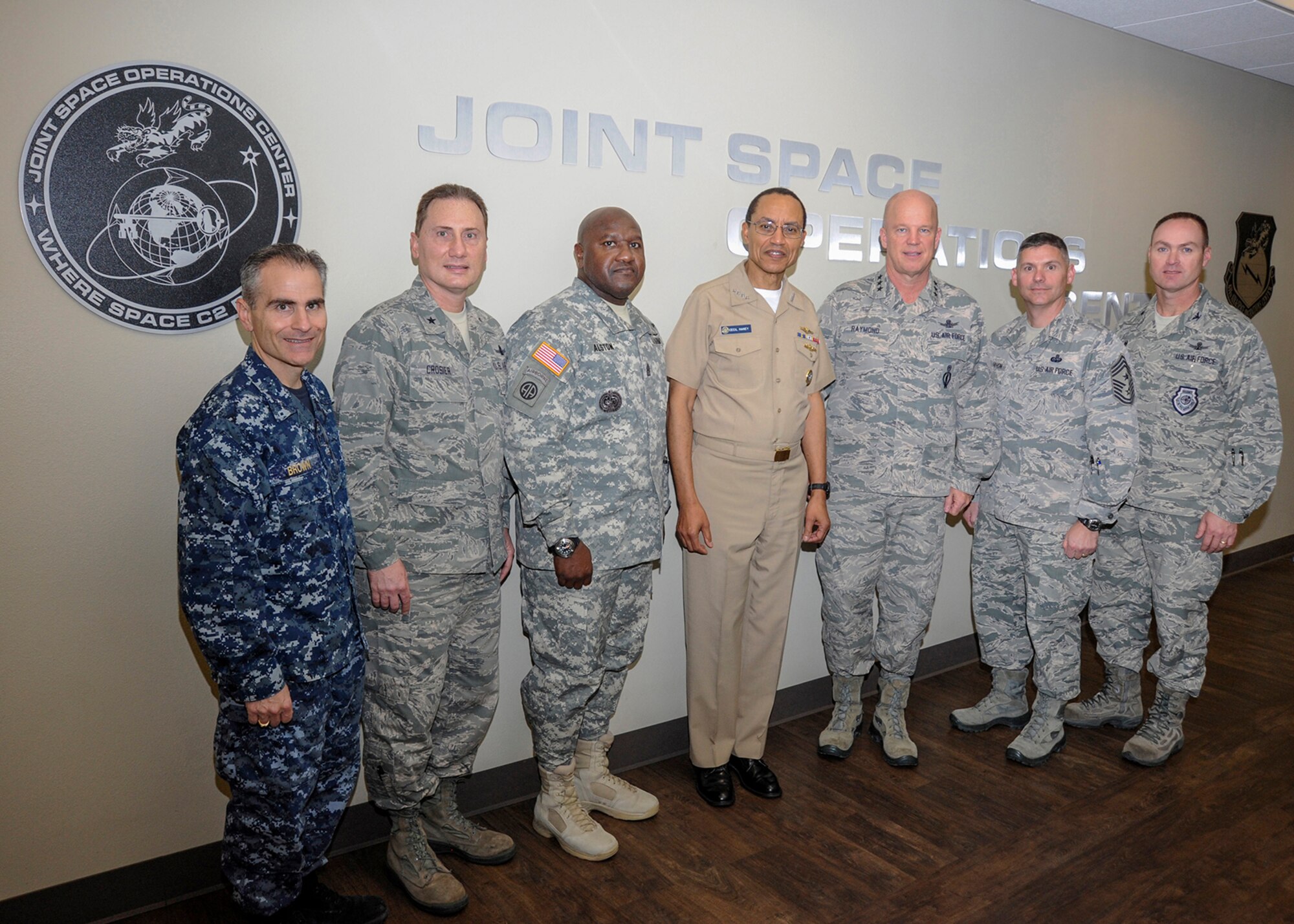 U.S. Navy Adm. Cecil D. Haney, U.S. Strategic Command commander (center), takes time for a group photo with 14th Air Force (Air Forces Strategic) and Joint Force Component Command for Space Commander, U.S. Air Force Lt. Gen. John. W. Raymond and his staff, and accompanying members of USSTRATCOM during the admiral's visit to Vandenberg Air Force Base, Calif., Dec. 10, 2014. While there, Haney and other senior leaders from USSTRATCOM visited several facilities that support USSTRATCOM's global cyber, space and nuclear deterrence missions, including JFCC Space. (U.S. Air Force photo by Airman 1st Class Robert Volio/Released)