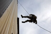 Members from the 341st Security Forces Group Tactical Response Force rappel during a training exercise Dec. 10 at Malmstrom Air Force Base. TRF members begin their training as assaulters and go on to acquire one of two additional skill sets in the fields of breaching systems or nuclear advanced designated marksmen, commonly referred to as snipers. (U.S. Air Force photo/ 2nd Lt. Annabel Monroe)  