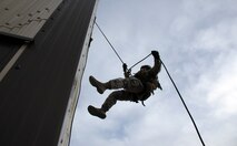 Members from the 341st Security Forces Group Tactical Response Force rappel during a training exercise Dec. 10 at Malmstrom Air Force Base. TRF members begin their training as assaulters and go on to acquire one of two additional skill sets in the fields of breaching systems or nuclear advanced designated marksmen, commonly referred to as snipers. (U.S. Air Force photo/ 2nd Lt. Annabel Monroe)  