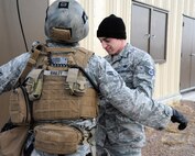 Members from the 341st Security Forces Group Tactical Response Force rappel during a training exercise Dec. 10 at Malmstrom Air Force Base. TRF members begin their training as assaulters and go on to acquire one of two additional skill sets in the fields of breaching systems or nuclear advanced designated marksmen, commonly referred to as snipers. (U.S. Air Force photo/ 2nd Lt. Annabel Monroe)  
