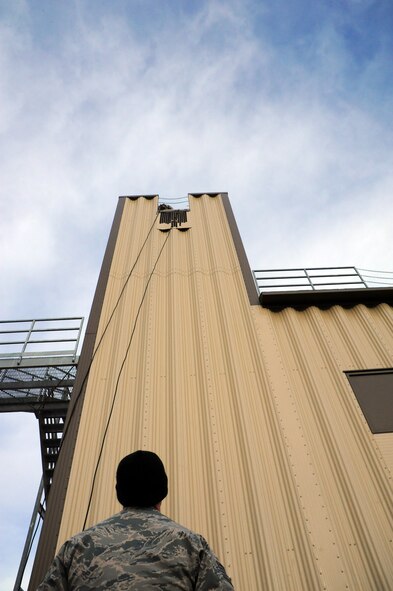 Members from the 341st Security Forces Group Tactical Response Force rappel during a training exercise Dec. 10 at Malmstrom Air Force Base. TRF members begin their training as assaulters and go on to acquire one of two additional skill sets in the fields of breaching systems or nuclear advanced designated marksmen, commonly referred to as snipers. (U.S. Air Force photo/ 2nd Lt. Annabel Monroe)  