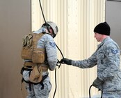 Members from the 341st Security Forces Group Tactical Response Force rappel during a training exercise Dec. 10 at Malmstrom Air Force Base. TRF members begin their training as assaulters and go on to acquire one of two additional skill sets in the fields of breaching systems or nuclear advanced designated marksmen, commonly referred to as snipers. (U.S. Air Force photo/ 2nd Lt. Annabel Monroe)  