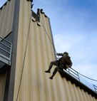 Members from the 341st Security Forces Group Tactical Response Force rappel during a training exercise Dec. 10 at Malmstrom Air Force Base. TRF members begin their training as assaulters and go on to acquire one of two additional skill sets in the fields of breaching systems or nuclear advanced designated marksmen, commonly referred to as snipers. (U.S. Air Force photo/ 2nd Lt. Annabel Monroe)  