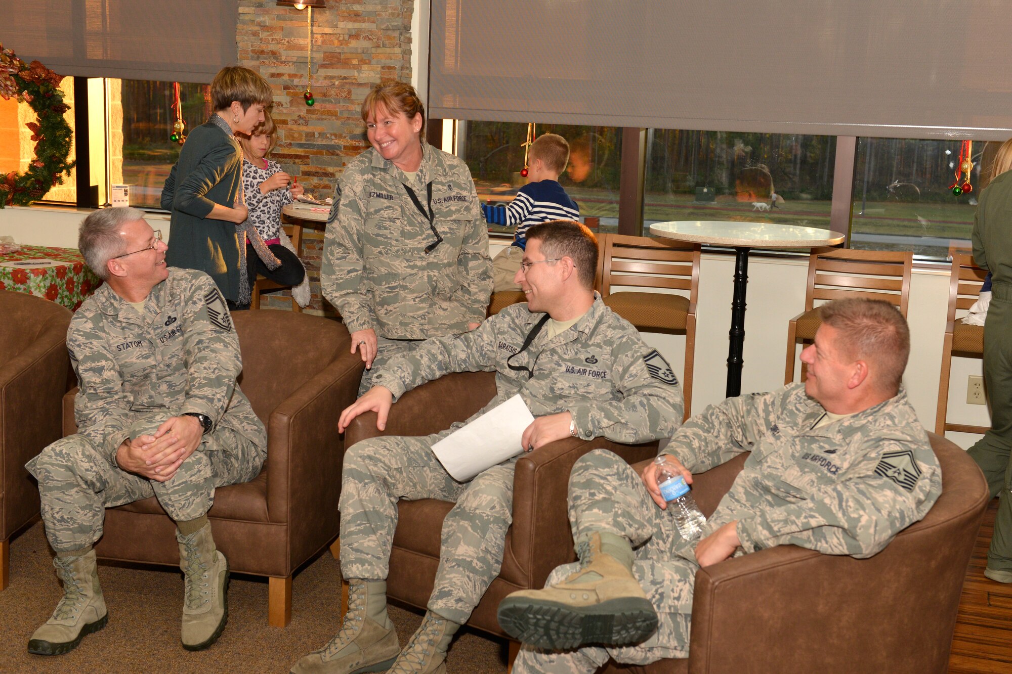 TYNDALL AIR FORCE BASE, Fla. – Members of Air Forces Northern and their families socialize at the annual tree-lighting ceremony held inside the Killey Center for Homeland Operations Tuesday. The event included arts and crafts for kids, a cookie swap and refreshments following the ceremony. (U.S. Air Force Photo by Master Sgt. Kurt Skoglund/Released) 

