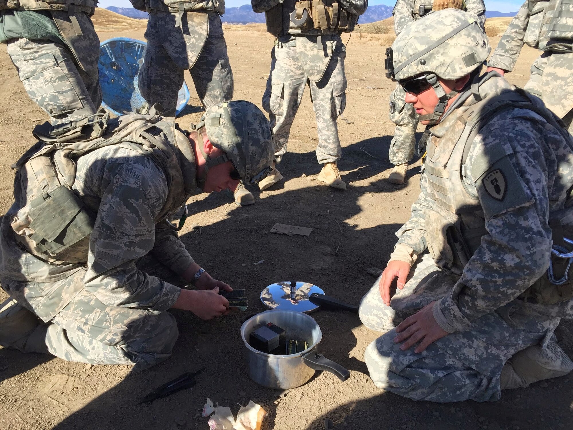 Cadet 1st Class Blake Kidd prepares an explosive charge during a training
event hosted by Fort Carson Nov. 20, 2014. Soldiers from Fort Carson's explosive
ordnance disposal company hosted a training event involving nine Academy
cadets who are taking the Academy's Chemistry of Weapons Class. (Air Force
photo)
